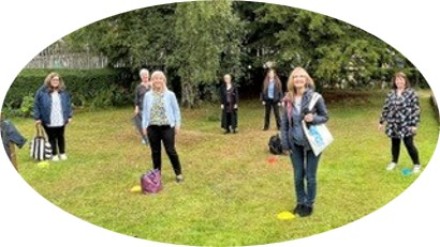A group of our ladies singing in the garden in Milngavie, Glasgow